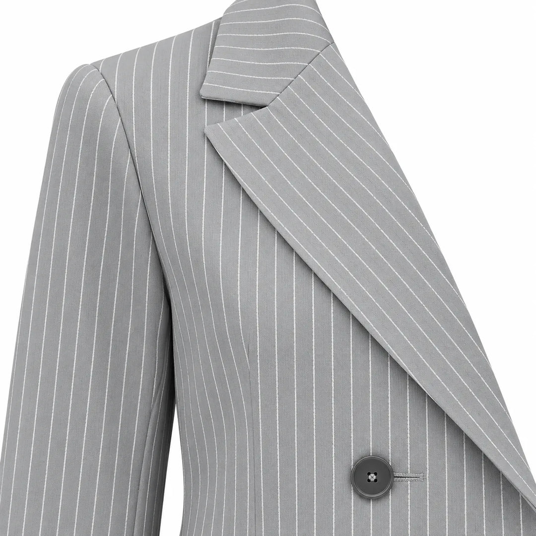 Close-up of the gray pinstripe lapel and dark jacket button, showing the front garment details, on a seamless white backdrop.