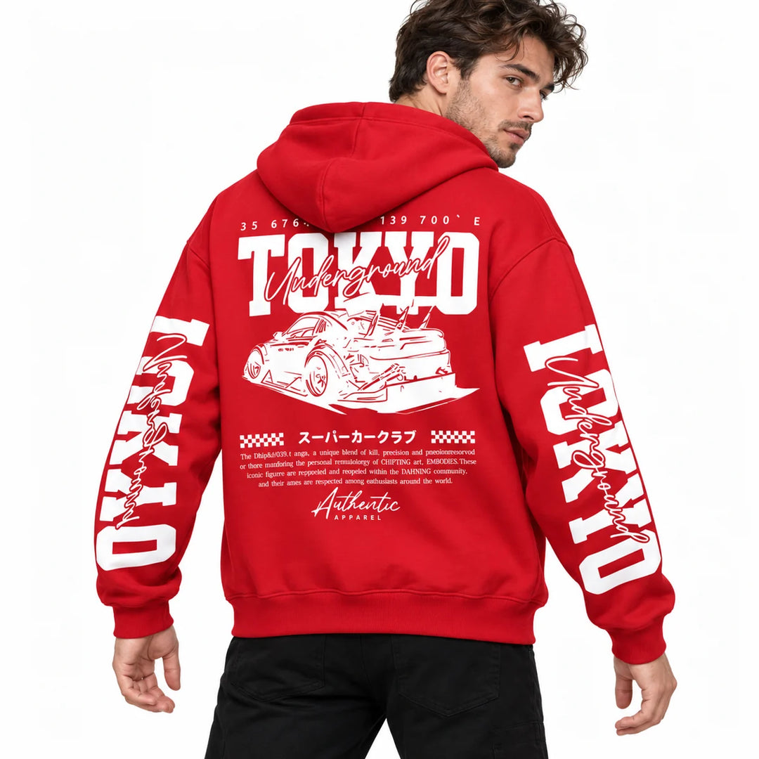 Male model wearing Red Tokyo racing graphic hoodie, showing back artwork and sleeve prints