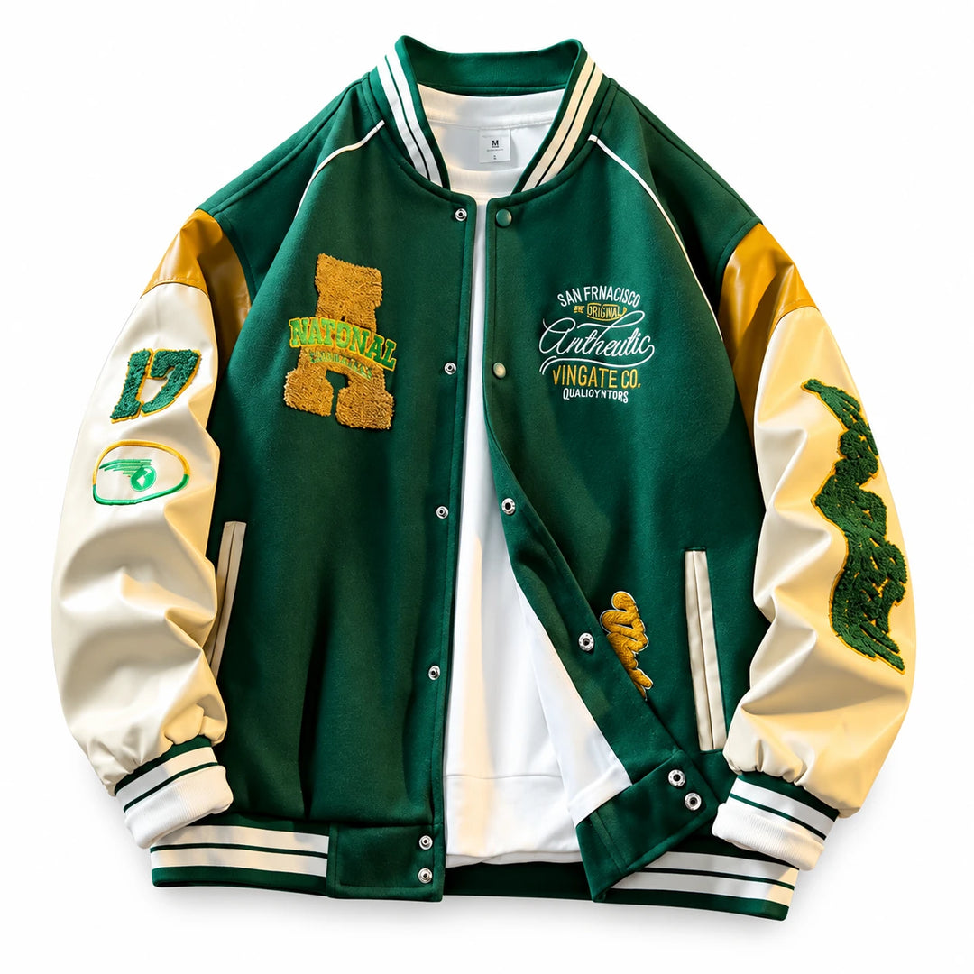 Green varsity jacket front view with cream sleeves, yellow shoulder panels, chest embroidery and striped ribbed trim.
