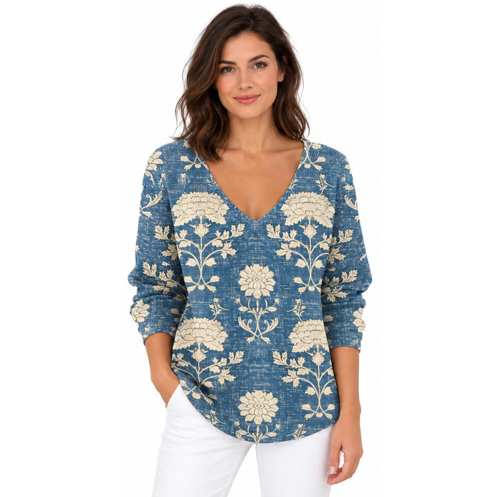 Woman wearing the Blue Floral V-neck long sleeve T-shirt on a white background.