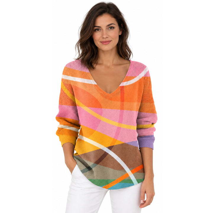 Woman wearing the Orange and Pink Abstract V-neck long sleeve T-shirt on a white background.