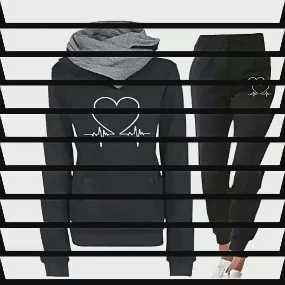 women's love heart printed sports suit hood up view on model in green color showcasing cozy design and long sleeve comfort for cooler days