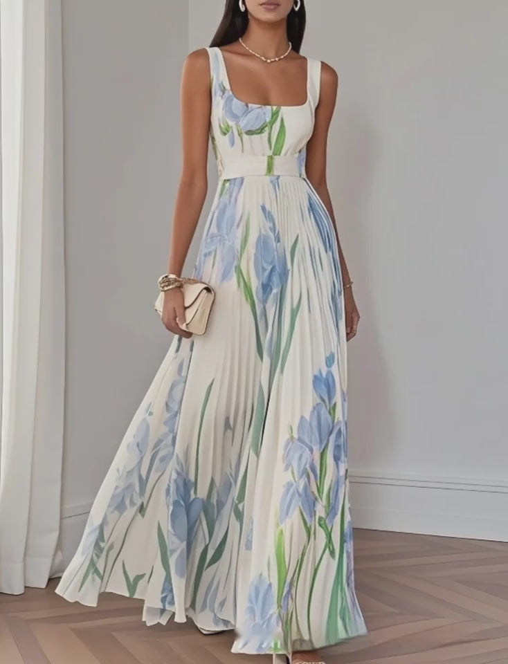 Floral pleated dress lifestyle shot for brunch, holidays, beach towns, and warm evenings