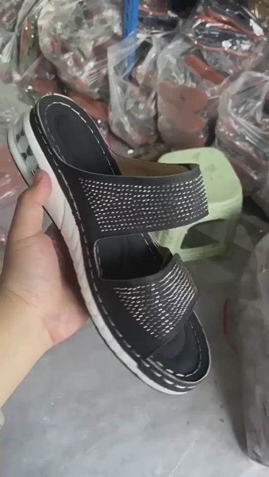 Rhinestone wedge sandals for women on studio model, highlighting rhinestone straps, open toe and sculpted wedge sole details.