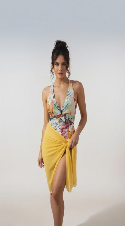 Women in retro swimsuit posing at pool edge, sun-drenched lifestyle photo
