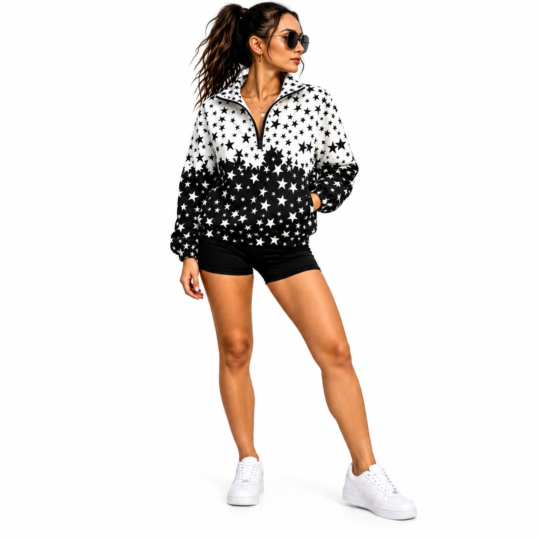 Woman wearing a black and white star jacket in a three-quarter front pose, showing the stand collar and partial front zipper.