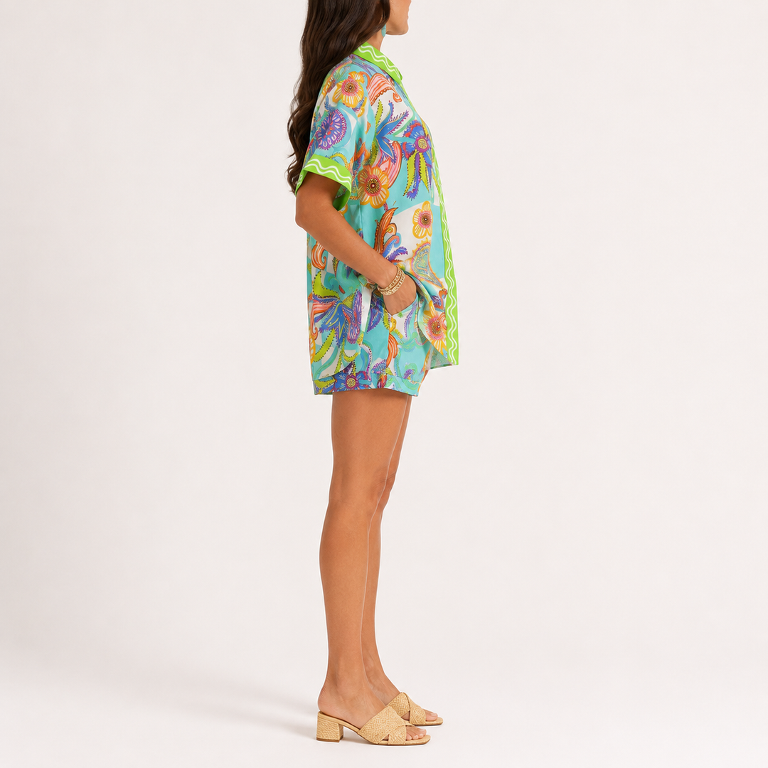 Lime printed button-down shirt and matching shorts set shown from the front, made from 100% polyester, for product reference.