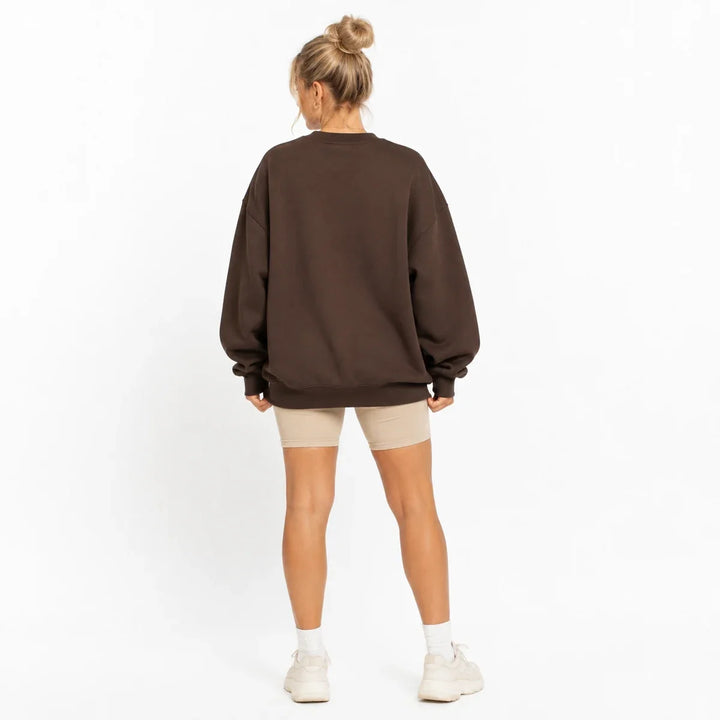 Coffee Brown printed sweatshirt for women shown from the back with oversized relaxed crew neck fit.