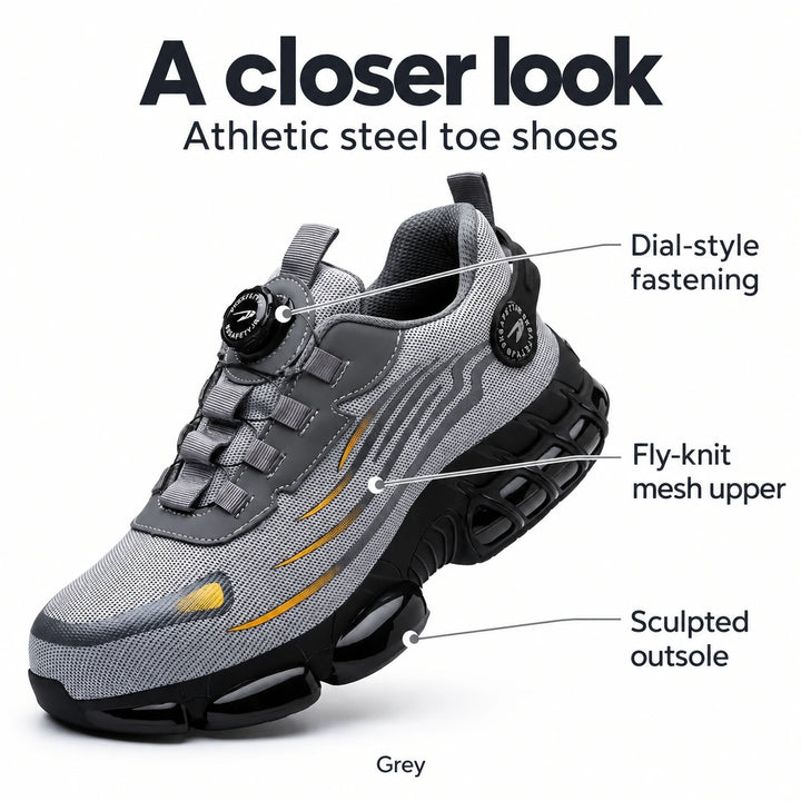 Grey athletic steel toe shoe showing the fly-knit mesh upper, dial-style fastening and sculpted outsole.