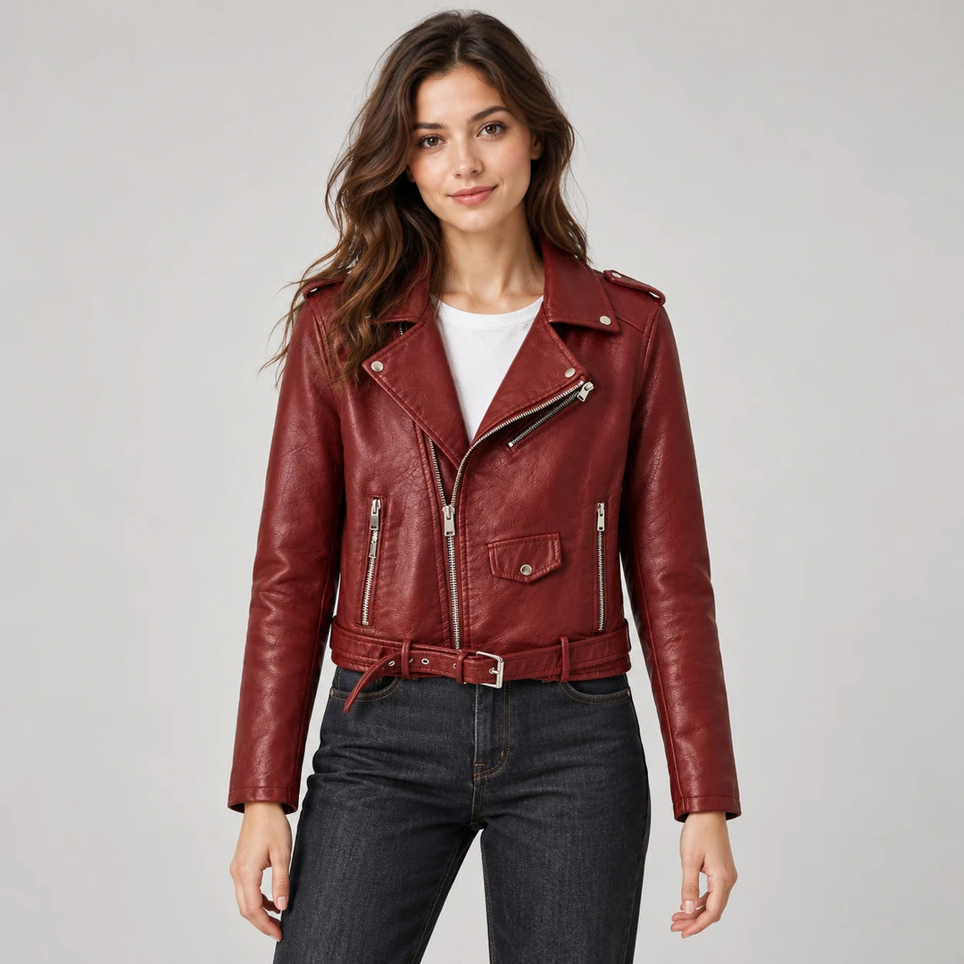 Model wearing the Wine Red belted jacket over a white top and dark jeans, with lapels, shoulder tabs, long sleeves and a belt
