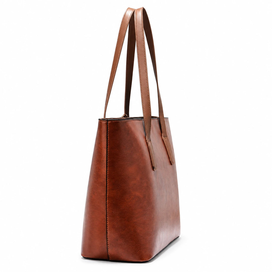 Side view of the Yellow Brown PU shoulder bag showing its gusset and stitched seam