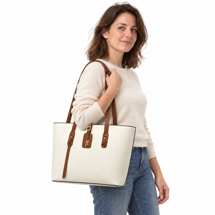 Model carrying the Beige White PU bucket shoulder bag with brown handles