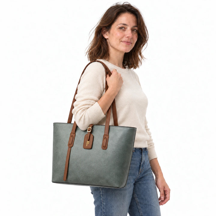 Model carrying the Gray Green PU bucket shoulder bag with brown handles