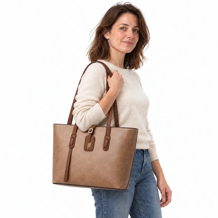 Model carrying the Khaki PU bucket shoulder bag with brown handles