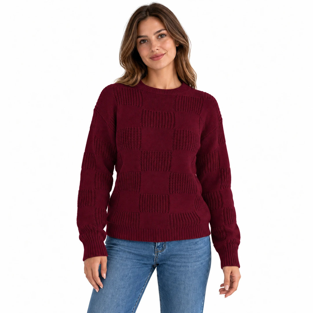 Front view of a model wearing the wine red openwork checkerboard knit sweater