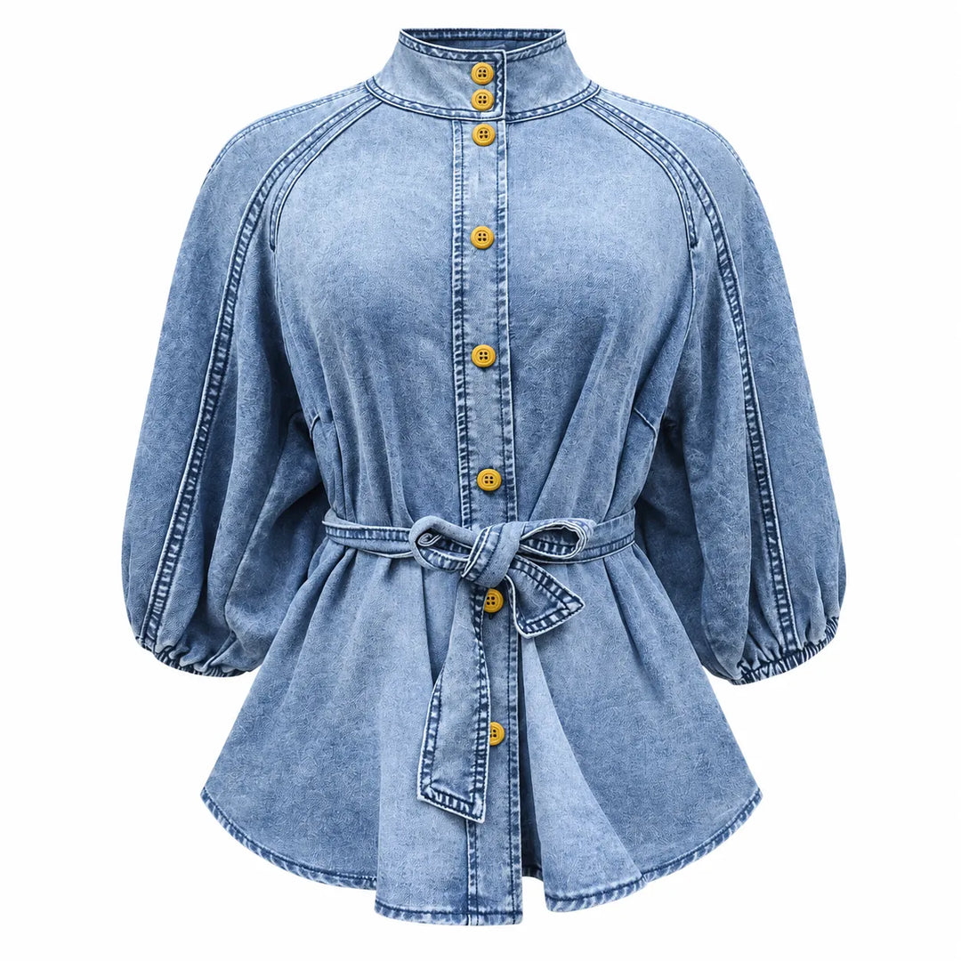 Front product view of the Washed Blue T0308 blouse, with yellow buttons, stand collar, gathered puff sleeves and a tied belt.