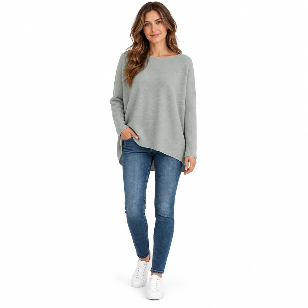 Adult woman modelling the Light Gray batwing sleeve pullover, in a front studio pose against a plain white studio background.