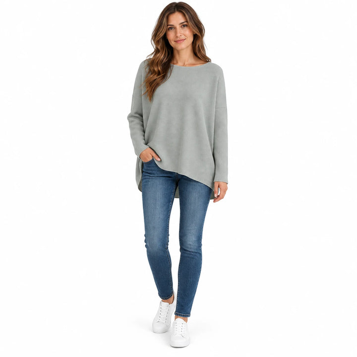 Adult woman modelling the Light Gray batwing sleeve pullover, in a front studio pose against a plain white studio background.
