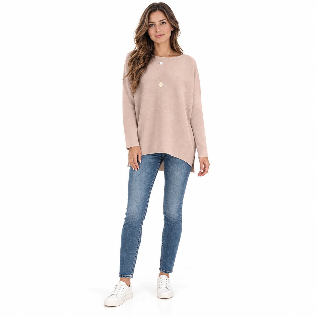 Adult woman wearing the Lotus Root Color batwing sleeve pullover, in a full-body front view against a plain white background.