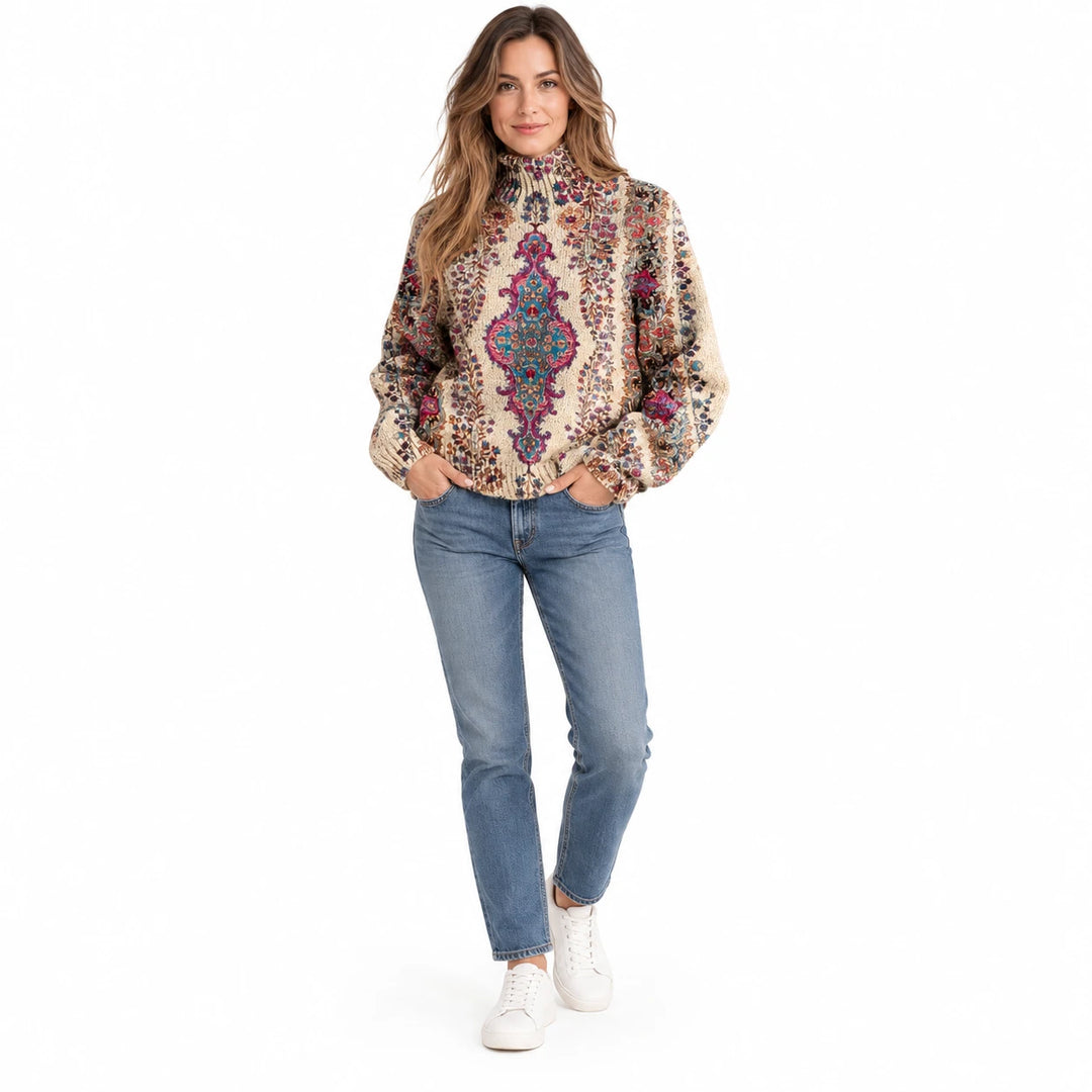 Adult woman wearing the printed high-neck pullover in the Turquoise design, in a front view against a plain white background.
