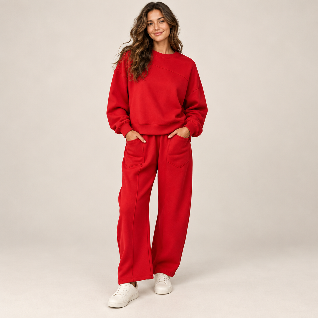 Red sweatshirt and wide-leg trouser set with front patch pockets on a full-length model