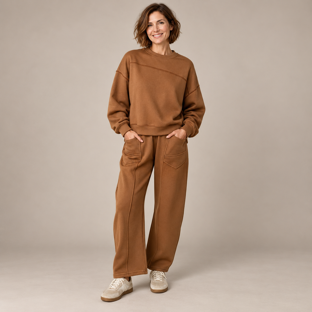 Brown sweatshirt and wide-leg trouser set with front patch pockets on a full-length model