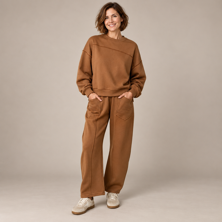 Brown sweatshirt and wide-leg trouser set with front patch pockets on a full-length model