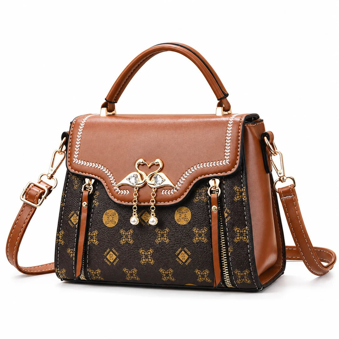 Brown Yellow square crossbody bag with patterned front and flap closure on a white background.