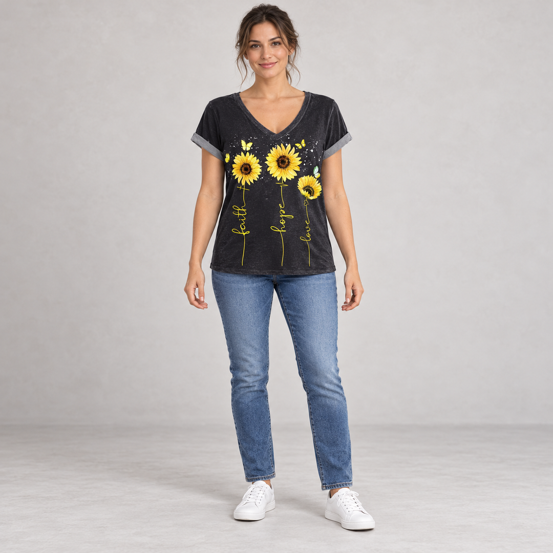 Front view of the black sunflower V-neck T-shirt with gray sleeve edges on a full-length model
