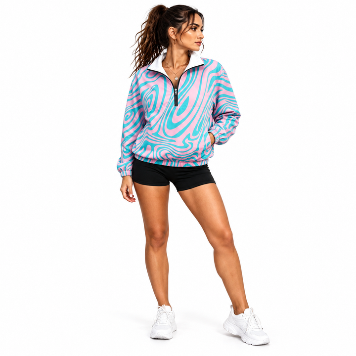 Woman wearing a pink and cyan swirl jacket in a three-quarter front pose, showing the collar facing and partial front zipper.