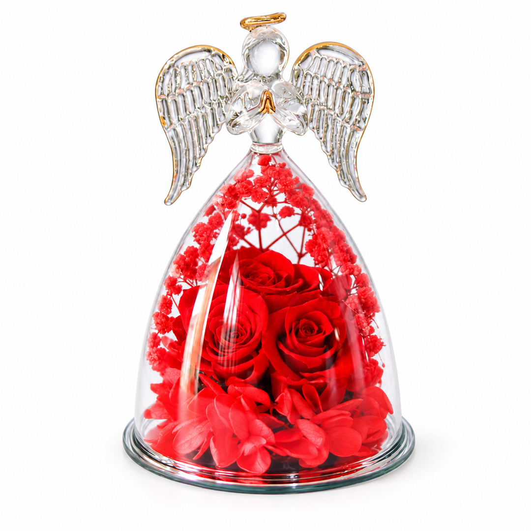 Beauty angel red with three red roses, red filler flowers, clear glass wings and gold halo, front view on a white background.
