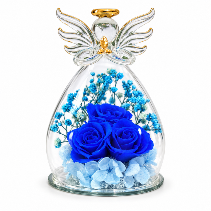 Large angel blue with three blue roses, pale blue flowers, spread glass wings and a gold halo on a seamless white background.