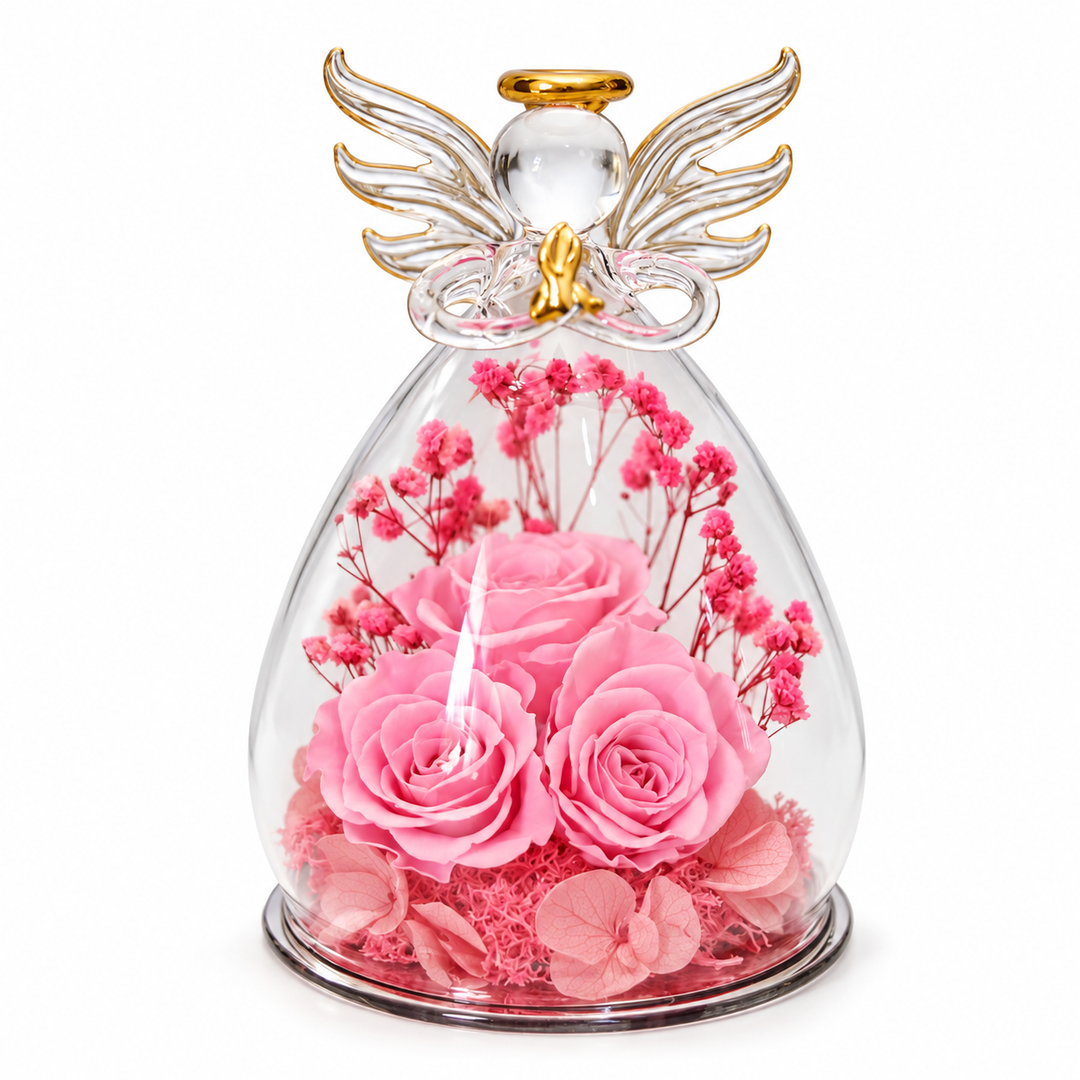Large angel pink with three pink roses, pink petals, spread clear glass wings and a gold halo on a seamless white background.