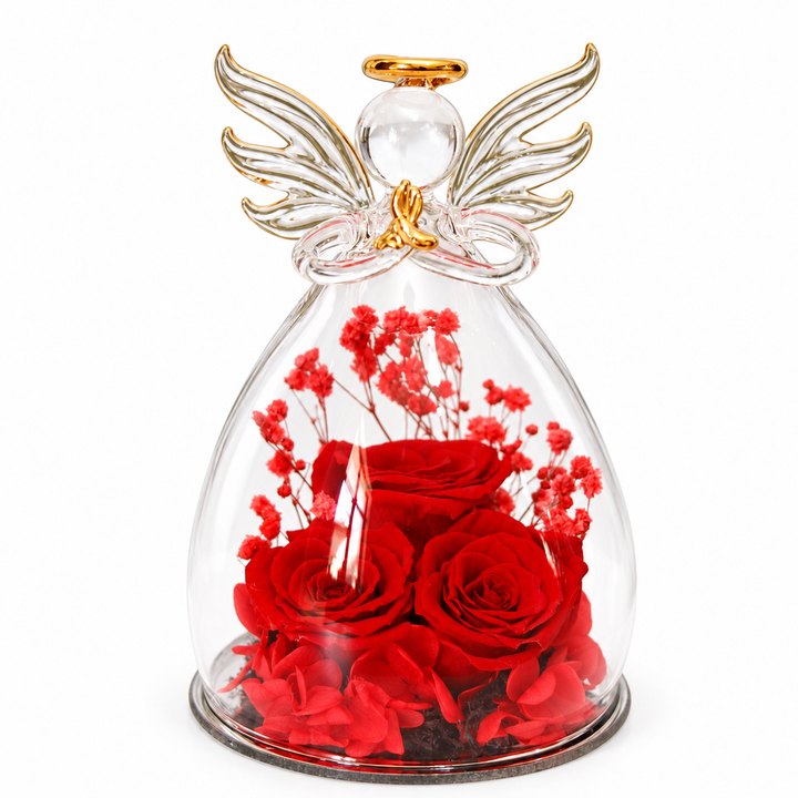 Large angel red with three red roses, red petals, spread clear glass wings and a gold halo, front view on a white background.