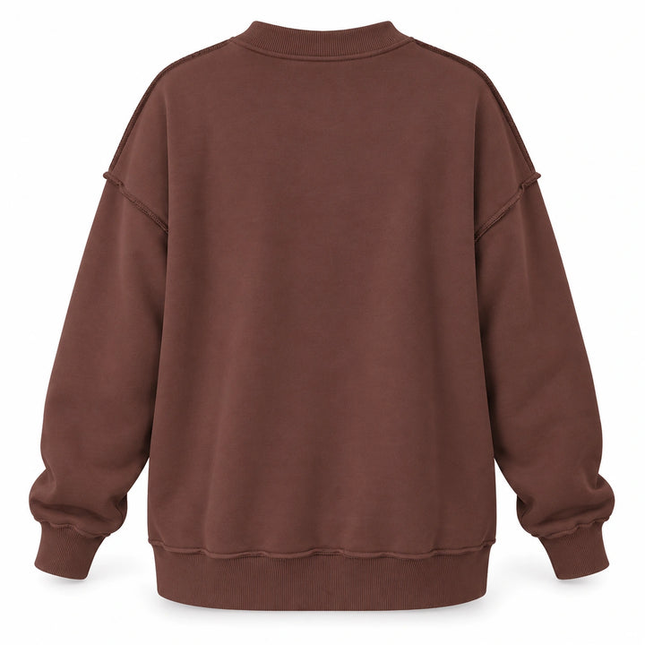 Back view of the dark brown sweatshirt showing dropped shoulders and exposed seams