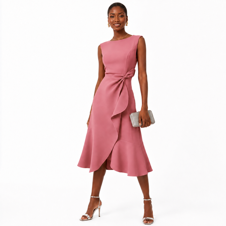 Sleeveless bow-knot midi dress in dusty pink with sculpted waist detail, flared hem and full-length model on a white background.