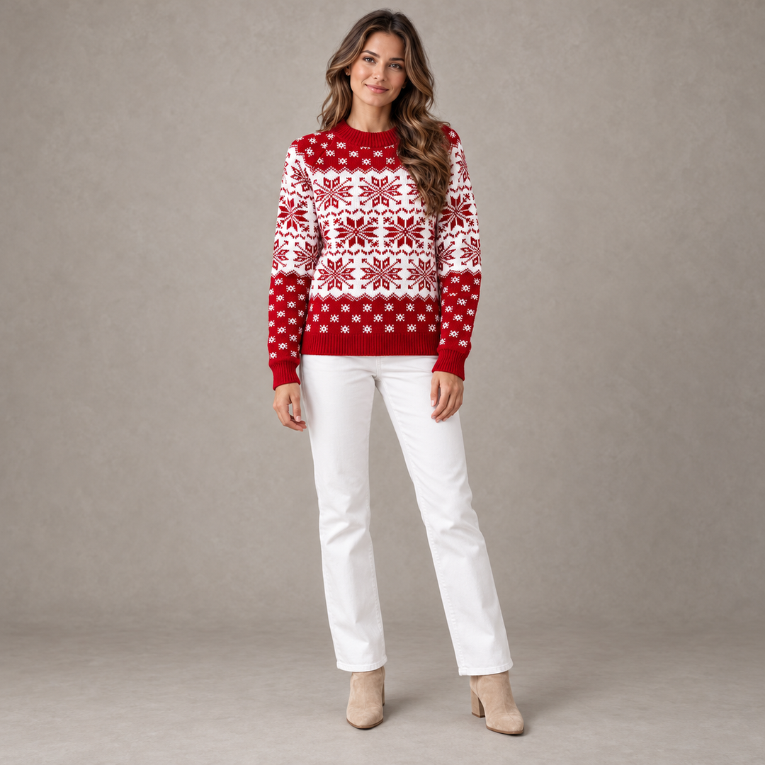Full-body model in a red-neck red and white snowflake sweater in a warm gray studio