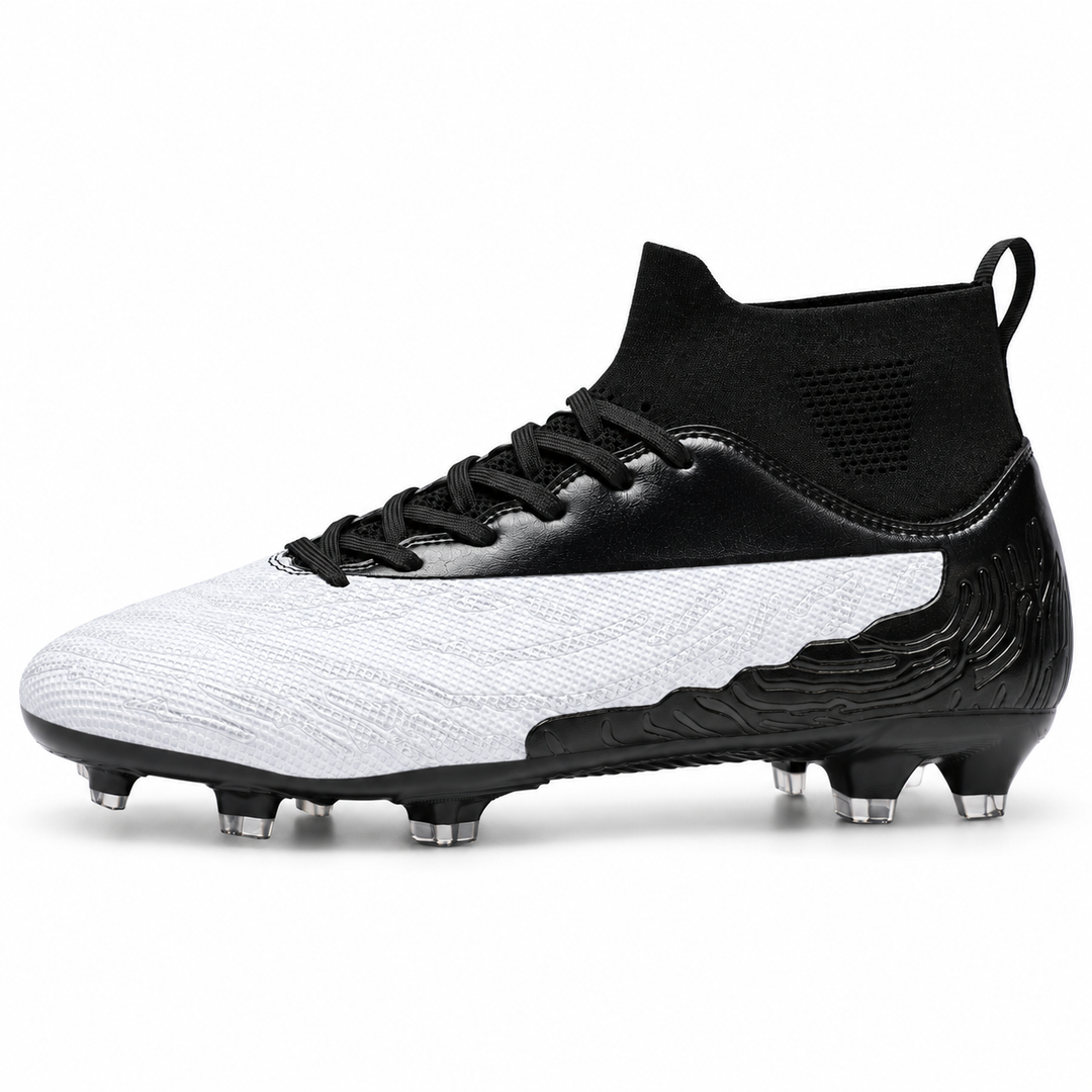 White and black soccer cleat in side profile on a clean white background with visible laces, ankle collar and outdoor studs.