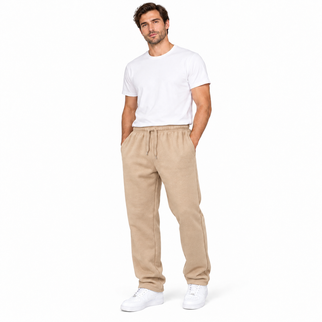 Camel sweatpants on a male model with elastic waist, drawstring and relaxed straight legs