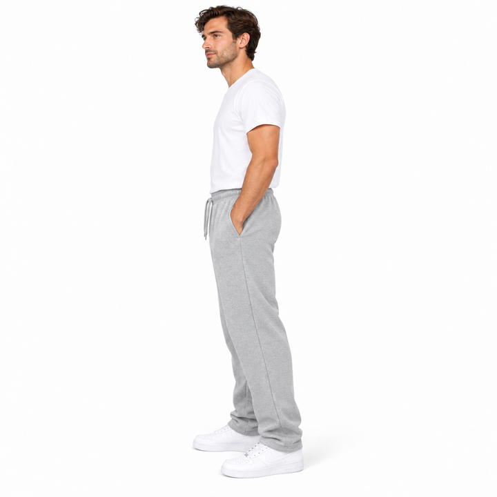 Light gray sweatpants side view on a full-body male model against a white background