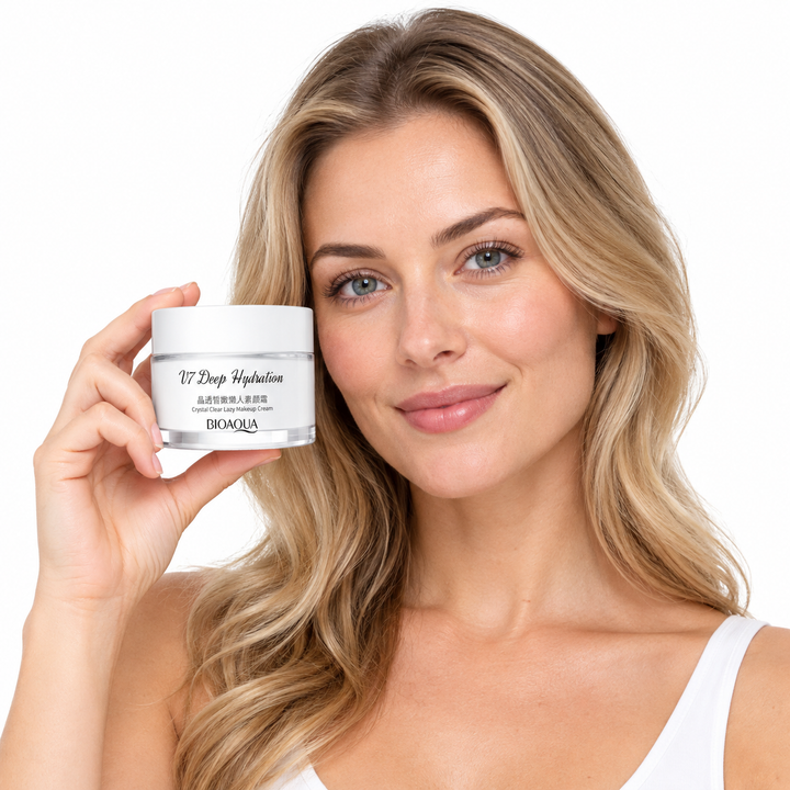 Adult woman holding a white BIOAQUA cosmetic jar beside her face, with natural skin tones and blonde hair on white background