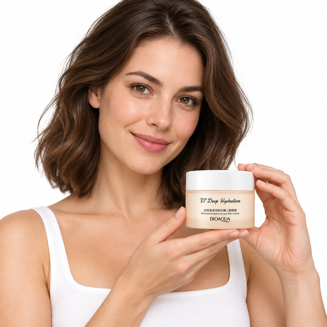 Brunette woman holding the peach BIOAQUA cosmetic jar at chest height, posing in her white clothing against a white backdrop.