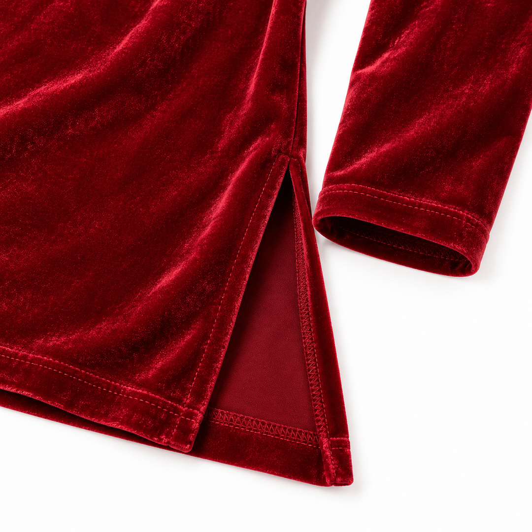 Close-up of red velvet side slit, hem and long sleeve stitching