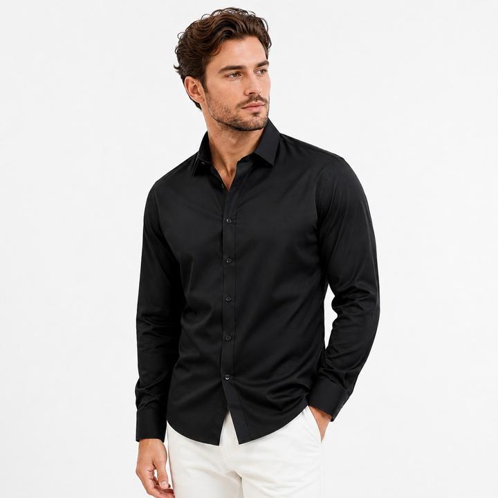 Mens slim fit shirt in black on a male model, showing long sleeves, lapel collar, front placket and a clean studio silhouette
