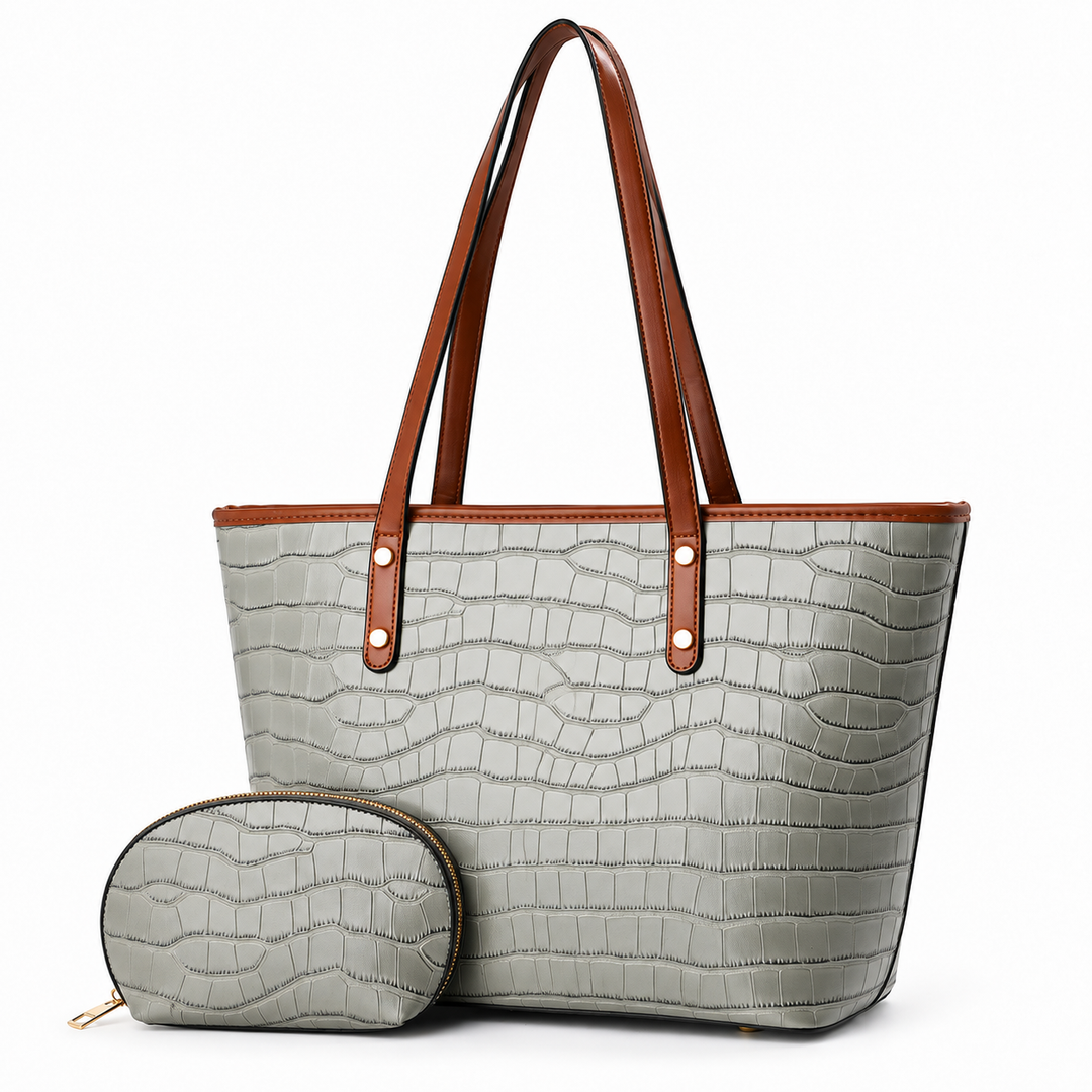 Gray crocodile-embossed tote bag with brown handles and matching zip pouch