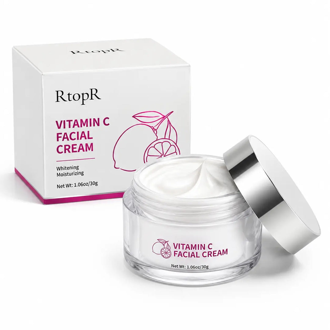 Open 30g Vitamin C Facial Cream jar showing smooth white cream texture with silver lid and carton on white background.