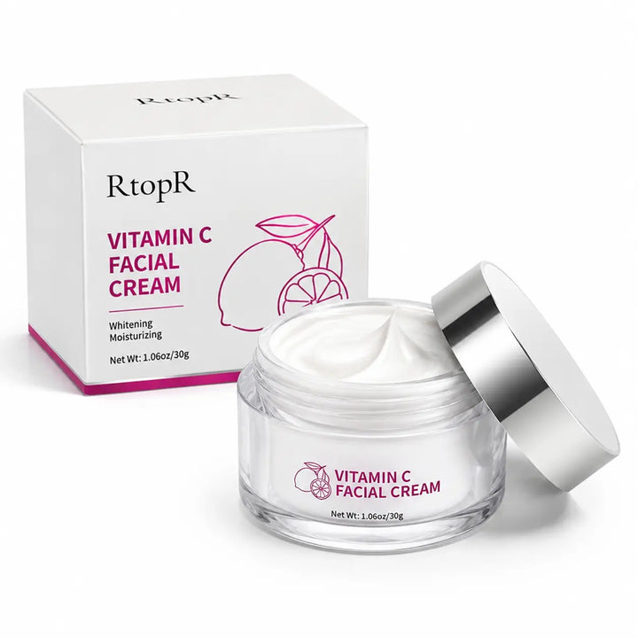 Open 30g Vitamin C Facial Cream jar showing smooth white cream texture with silver lid and carton on white background.