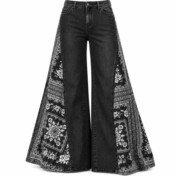 Washed black pants detail showing stitching, wide shape and white bandana-style print