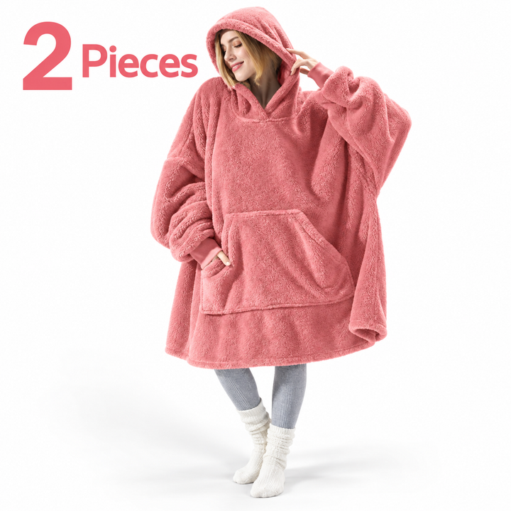 pink 2-piece wearable blanket hoodie set on model, oversized hood and front pocket