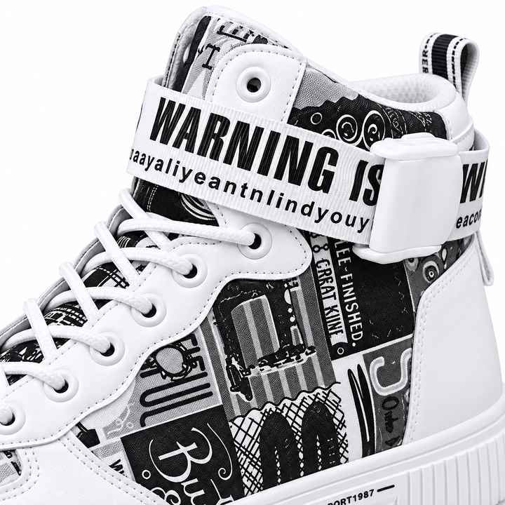 White Black high top sneaker close-up of laces ankle strap and graphic panels